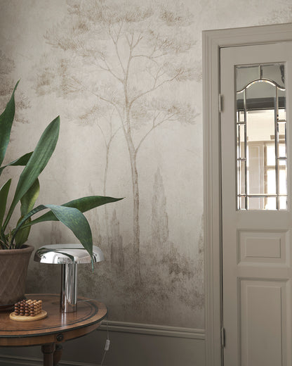 Andrea brings the serene beauty of Italian gardens indoors with its detailed pencil work depicting conifers and cypresses. This mural offers a refined, historical style that adds height and sophistication to any space, making it perfect for those who appreciate classic artistry.
