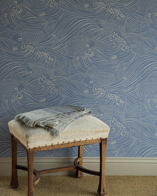 Wallpaper with inspiration from old woodcut techniques, Emma von Brömssen’s seemingly simple design Plenty more fish unveils an intriguing play with lines where fish hide in a wavy sea.