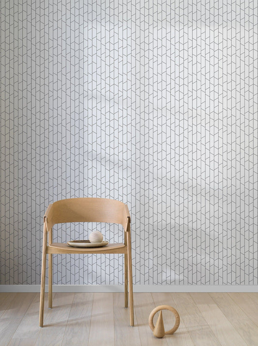 The bold simplicity of our Angle wallpaper in a black and white palette is inspired by the everyday lines seen around us, such as railings, facades, masts, and power lines.