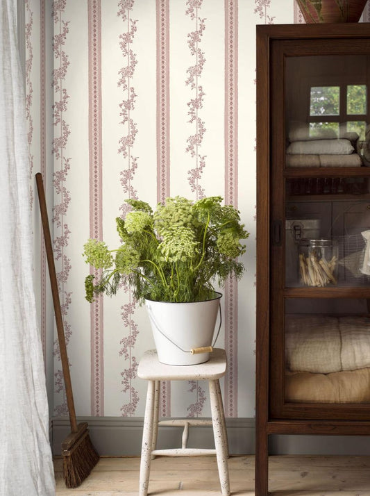 Featuring beautiful images of looping floral totems and banded daisies, this gorgeous design was inspired by small scraps of wallpaper found hanging in the old Drottningholm Palace Theatre. 