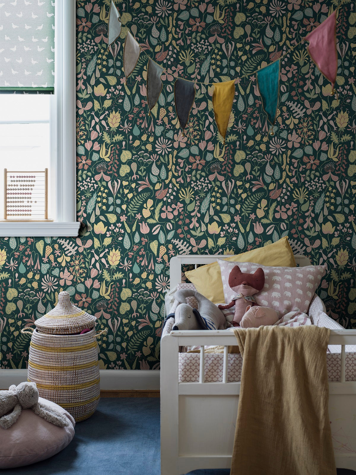 Featuring a beautiful softly multicolored floral design on a dark green background, our Herbarium wallpaper pays homage to the creative flair of the pattern’s designer, Stig Lindberg. 