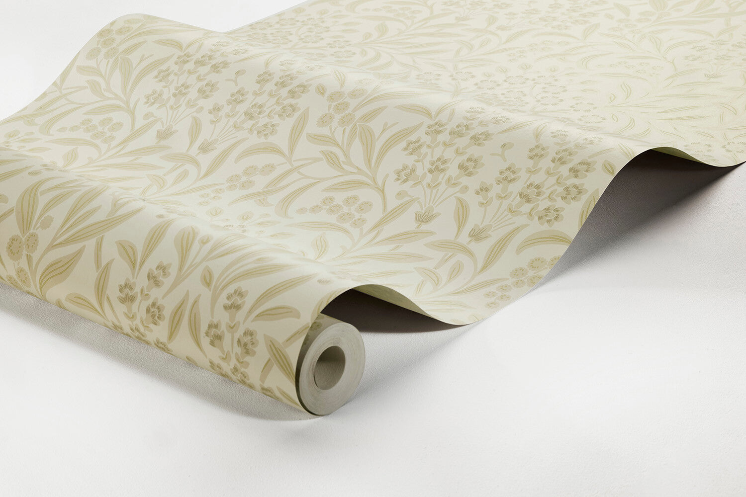 Colored in beige tones on a warm cream background, our Kryddhyllan wallpaper features a 1970’s pattern from our archives.