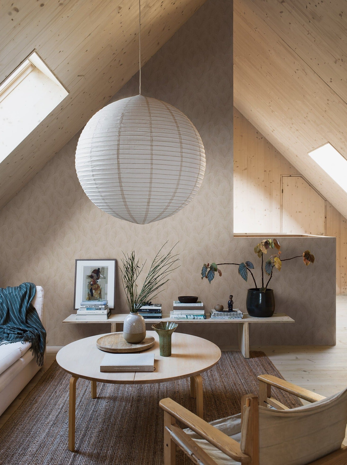 Pine Tree wallpaper celebrates the true loveliness of a wintery Nordic forest. 