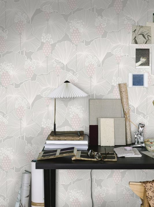 Colored in a pretty palette of palest grey and green, our Umbrella Leaves wallpaper adds a refreshing touch of light and vibrancy to the surrounding space. 