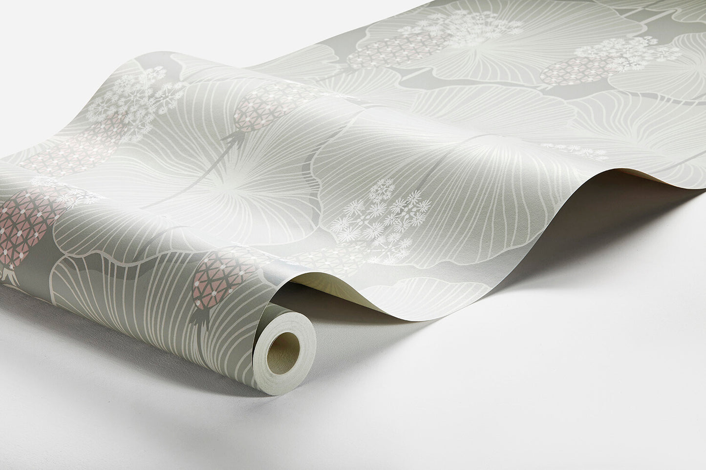 Colored in a pretty palette of palest grey and green, our Umbrella Leaves wallpaper adds a refreshing touch of light and vibrancy to the surrounding space. 