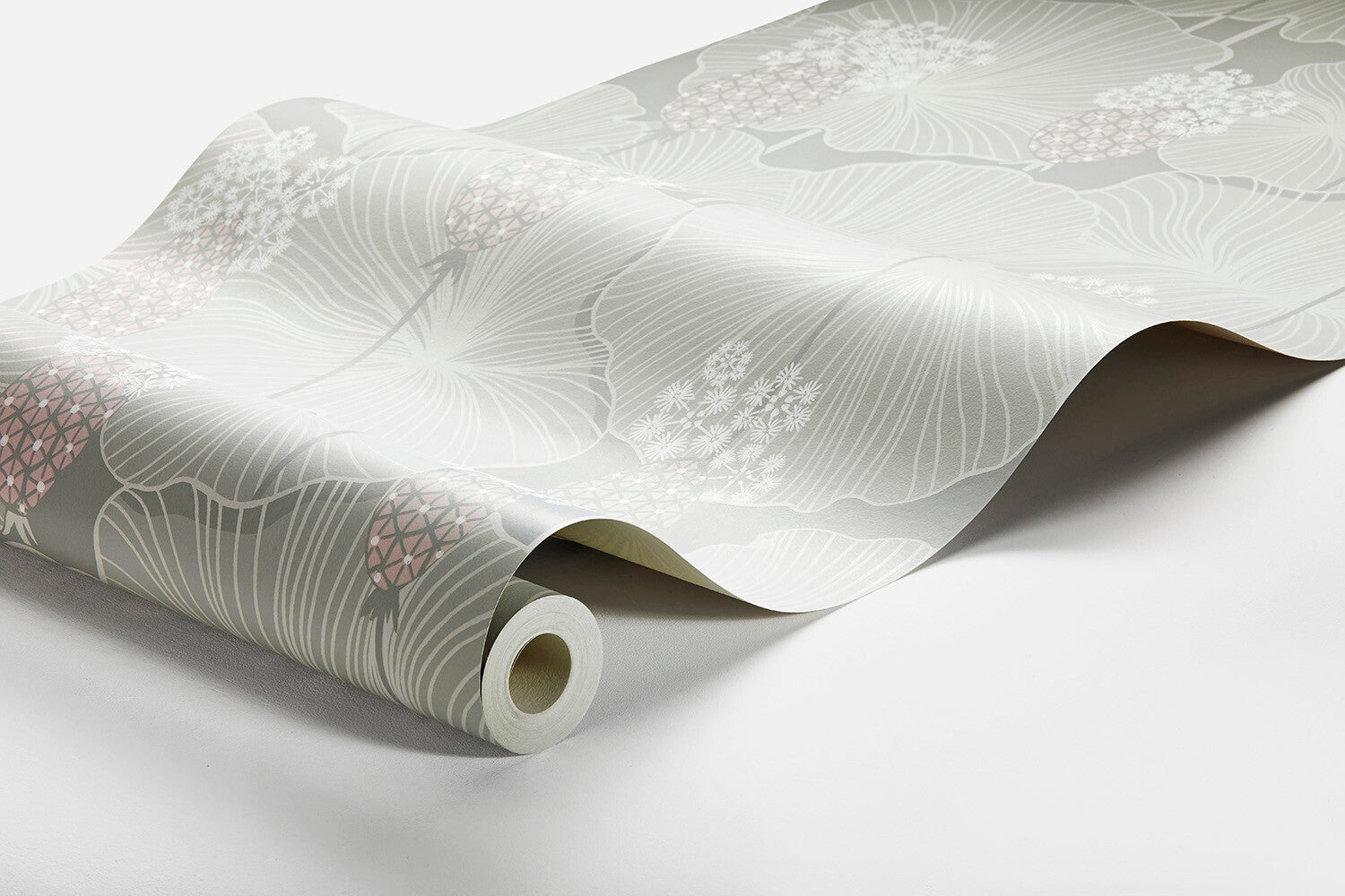 Colored in a pretty palette of palest grey and green, our Umbrella Leaves wallpaper adds a refreshing touch of light and vibrancy to the surrounding space. 