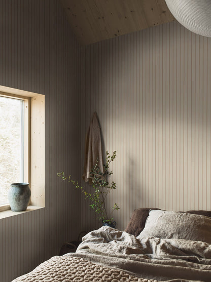 Woodland Stripe wallpaper is printed on our popular linen surface to create a tactile and cosy expression. 