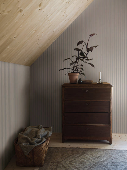 Woodland Stripe wallpaper is printed on our popular linen surface to create a tactile and cosy expression. 