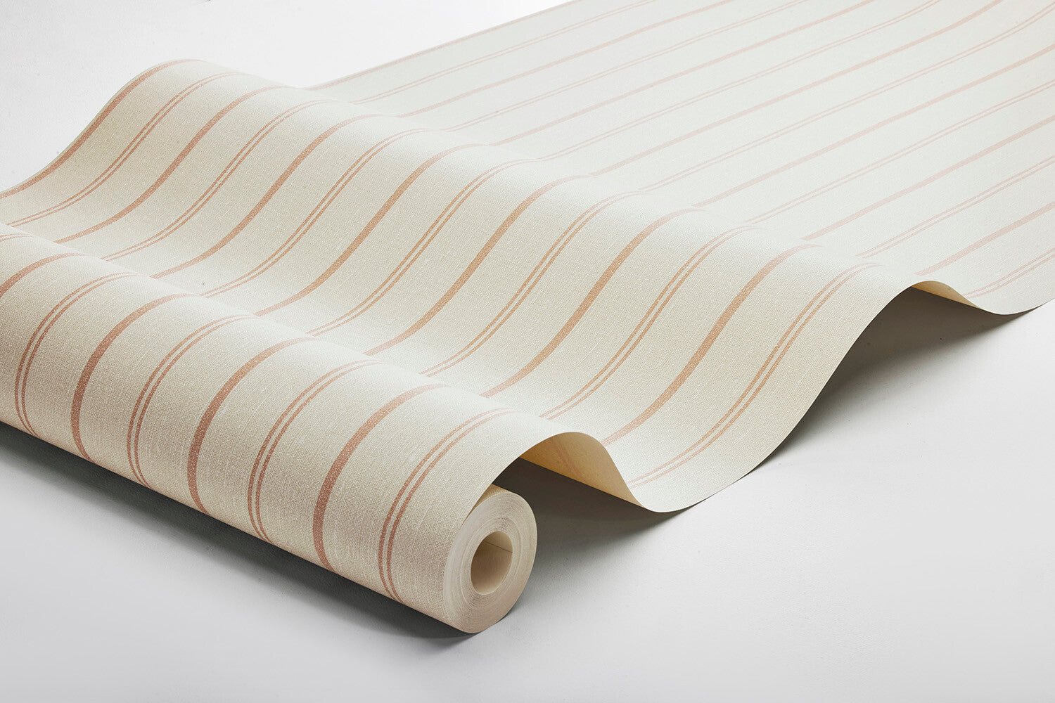 Woodland Stripe wallpaper is printed on our popular linen surface to create a tactile and cosy expression. 