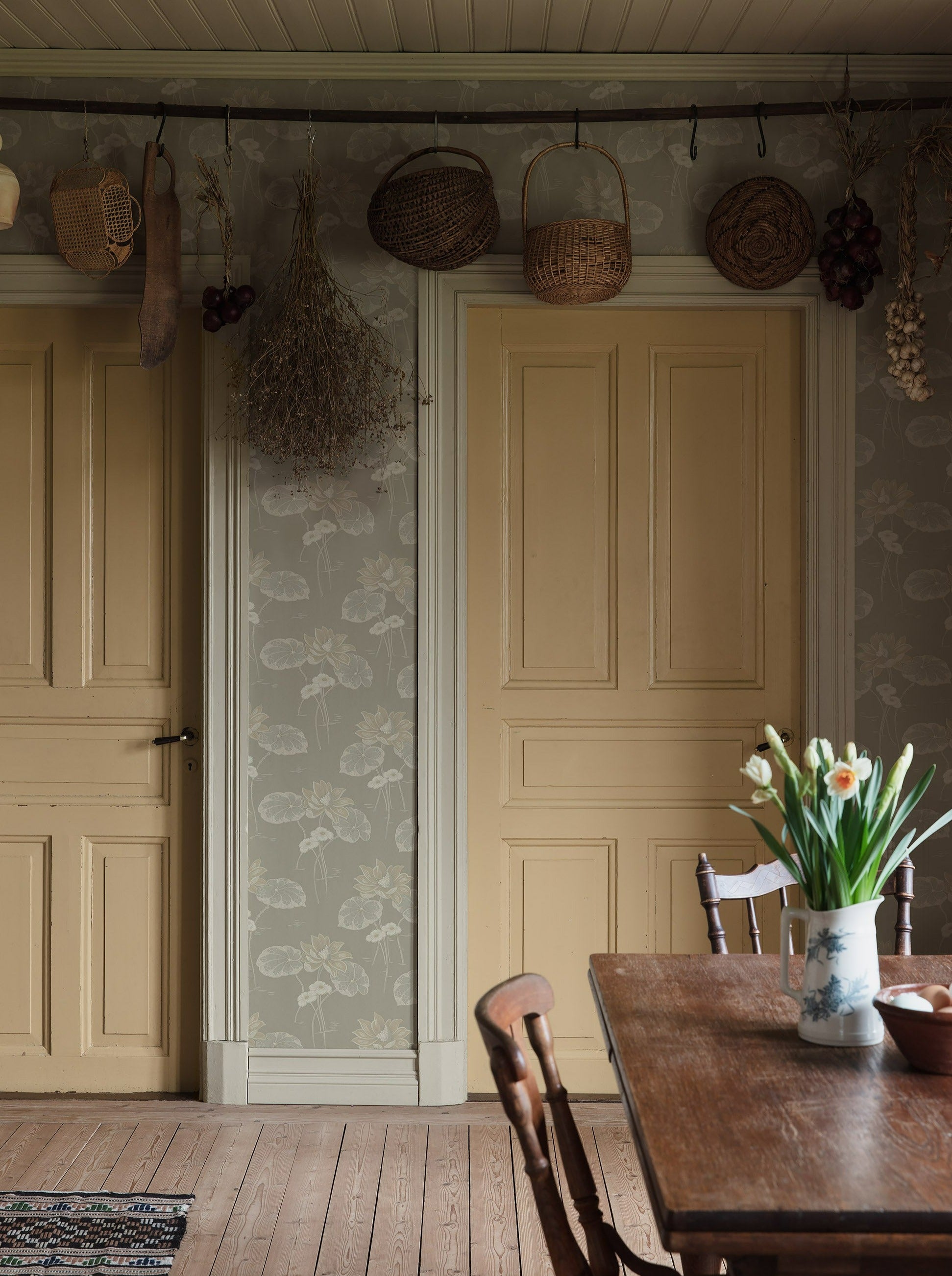  Colored in soft neutral palette of grey, white and gently shimmering silver tones, our Haga wallpaper is inspired by the beauty of Swedish nature. 
