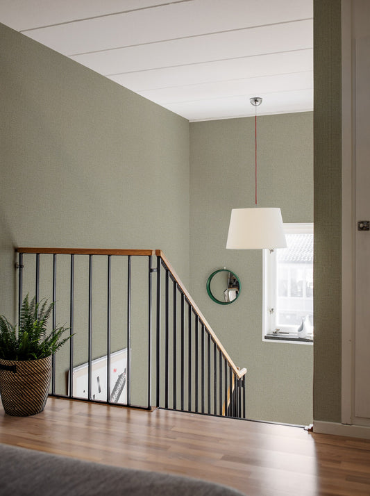  Colored in a fresh and stylish tone-on-tone sage green, our Vivalla wallpaper is inspired by the trends of the 1970s. 